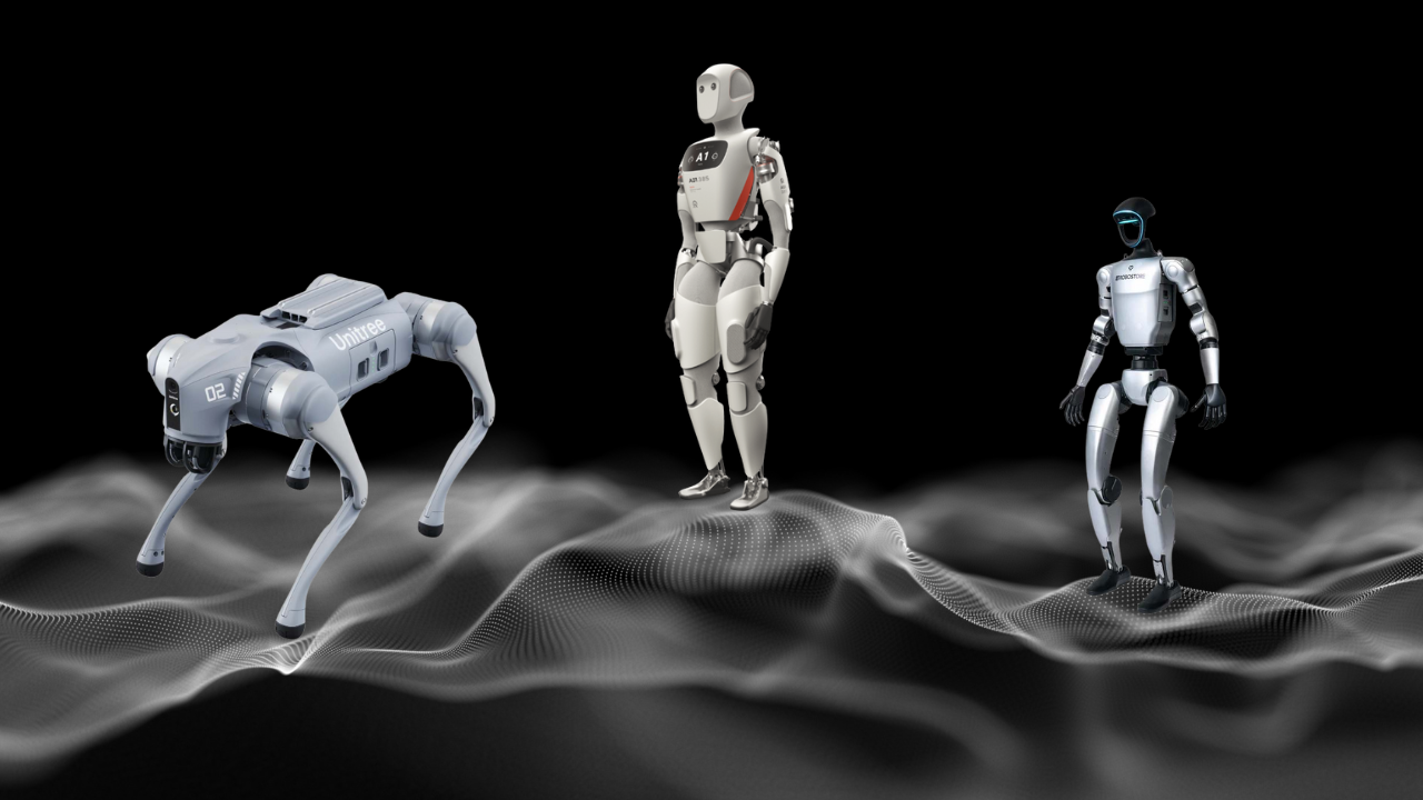 A gray, four-legged Unitree robot dog stands on the left, facing a fully bipedal, white and red humanoid robot in the center. A second, darker-colored humanoid robot stands on the right. All three robots are positioned on a low, wavy, white, dotted digital surface against a plain black background